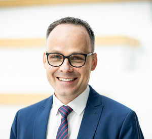 Portraitfoto des Staatssekretärs Dr. Denis Alt